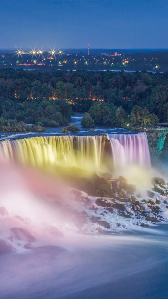 Horseshoe Falls illuminated at night in Niagara Falls, Ontario, Canada